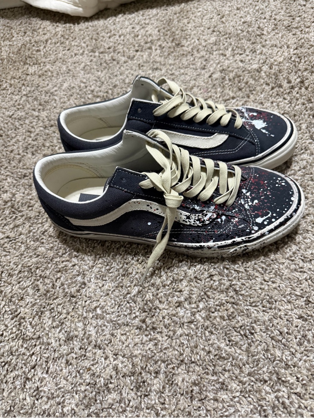 Vans Kids Low-Top Sneakers in Black with Cream and Red Paint-Splash
